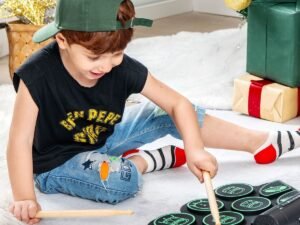 Electronic Drums 9 Pads MIDI Function 2 Stereo Speakers 2 Pedals 2 Sticks 7 Tythms and 4 Songs